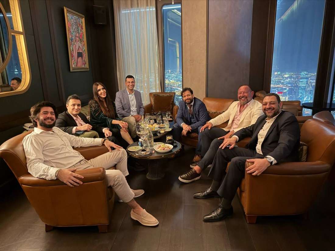 Investors talking in a private lounge