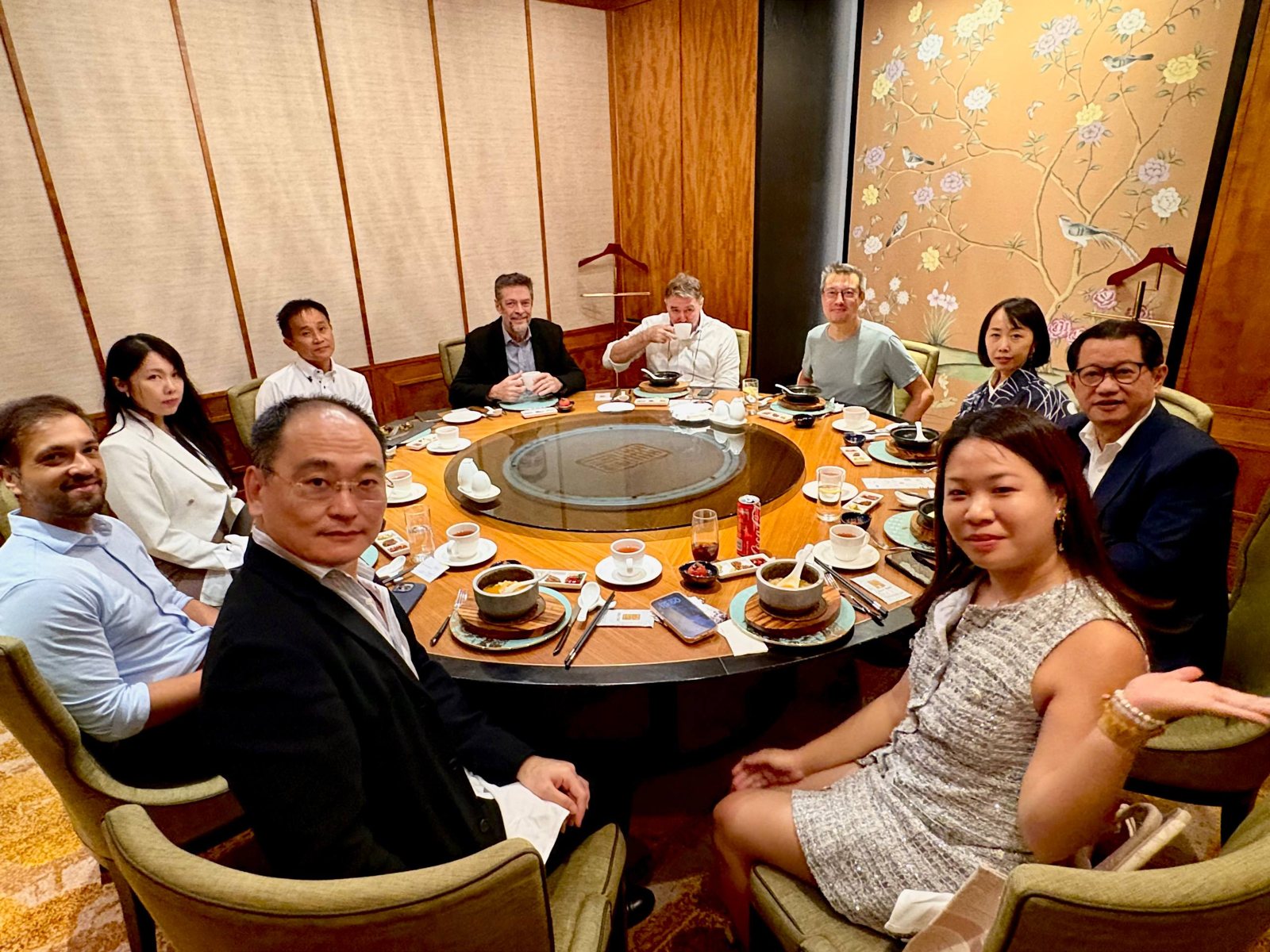 Investors around a Legends10 dinner table in Singapore